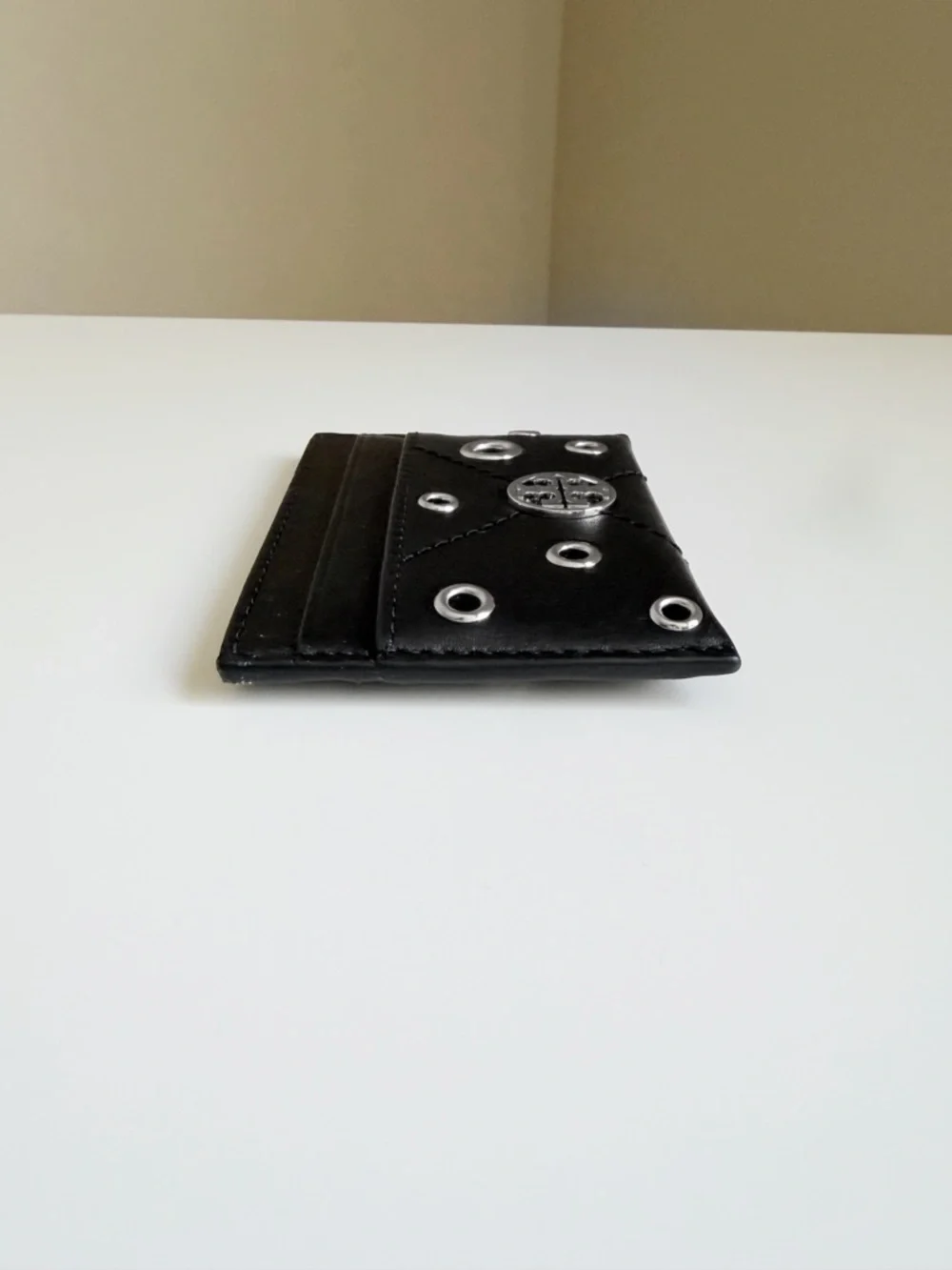 Tory Burch Black Leather Grommet Card Holder with Silver Logo